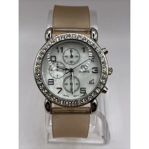 CG Women's Quartz Watch Rhinestone Bezel MOP Dial Plastic Band- New Battery‎